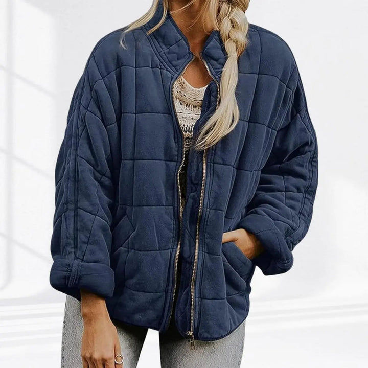 Women's lightweight quilted jacket, perfect for layering. Zip-up front & stand collar. Versatile casual fall outerwear.