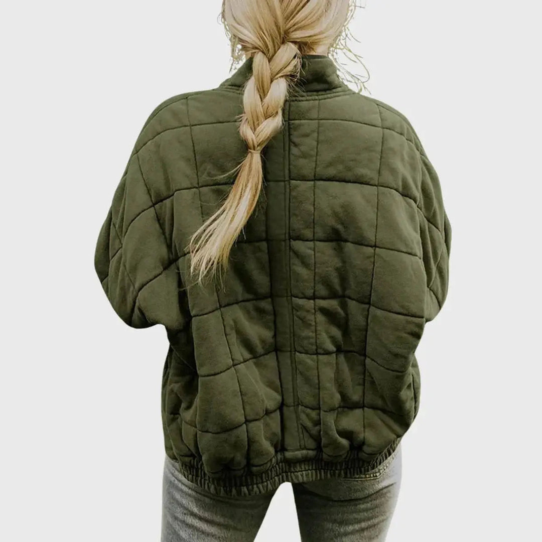 Stylish women's zip-up padded jacket featuring a stand collar & lightweight quilted design. Versatile fall outerwear.