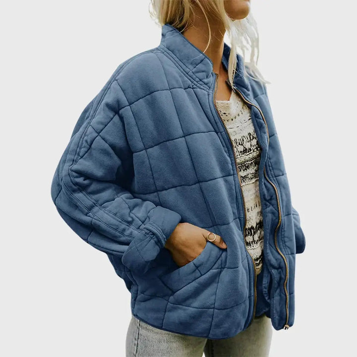 Versatile women's lightweight quilted jacket, zip-up & padded. Stand collar design. Great for everyday casual outerwear.