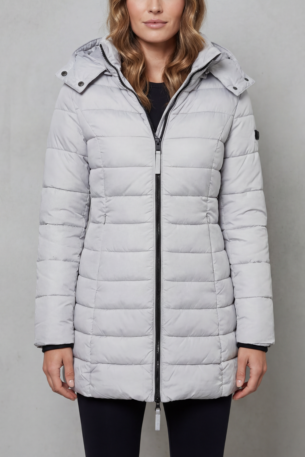 Women's lightweight quilted puffer coat for warmth & style, perfect for fall and winter fashion.