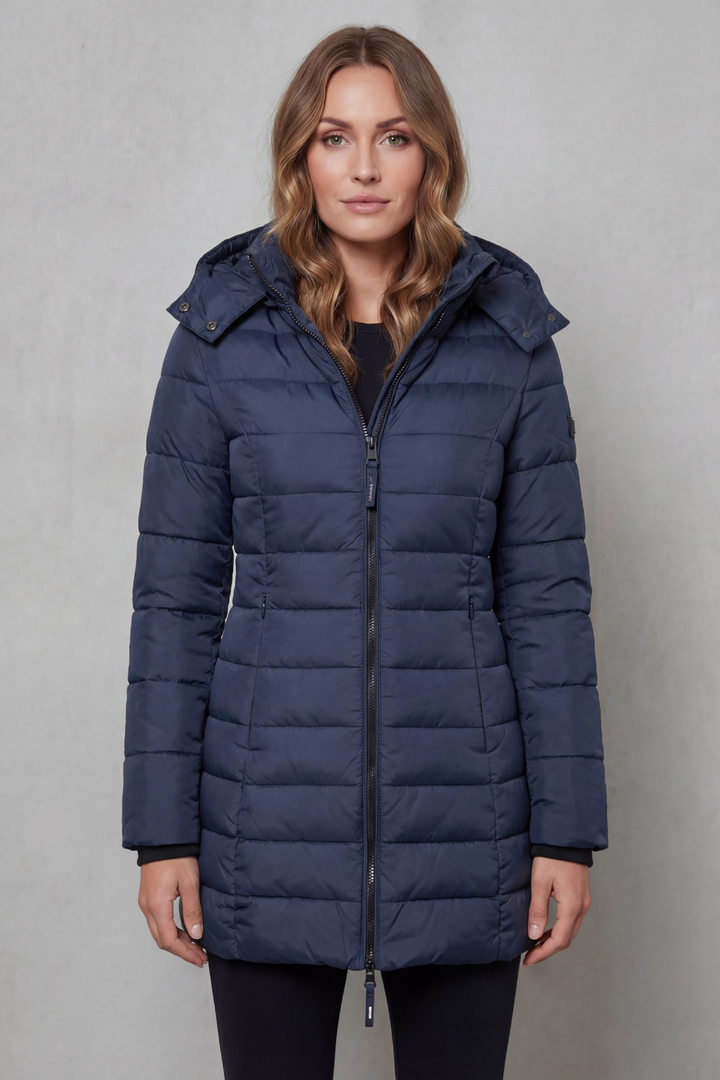 Cozy women's lightweight puffer coat, quilted for warmth and a stylish addition to any winter outfit.
