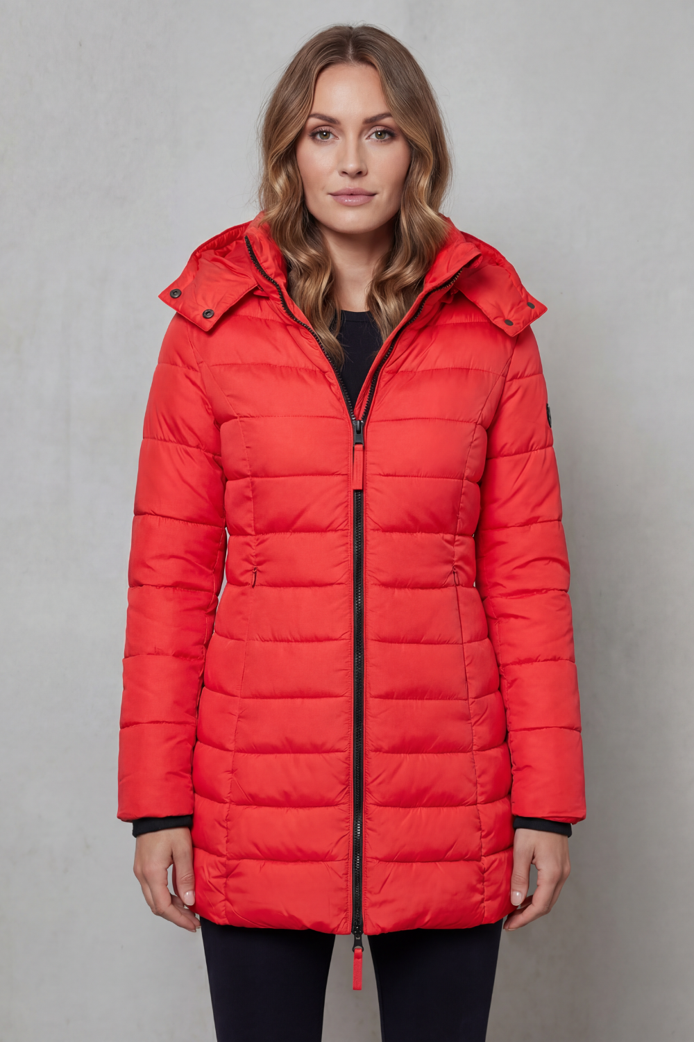 High-quality women's lightweight puffer coat, quilted for warmth, comfort, and stylish winter protection.