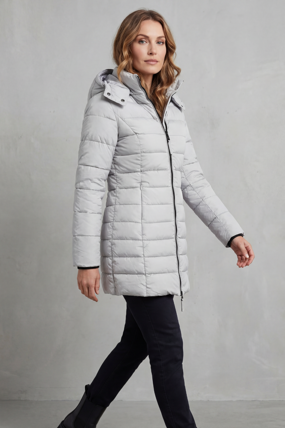 Warm women's puffer coat, lightweight & quilted design ideal for casual wear & layering in cold weather.