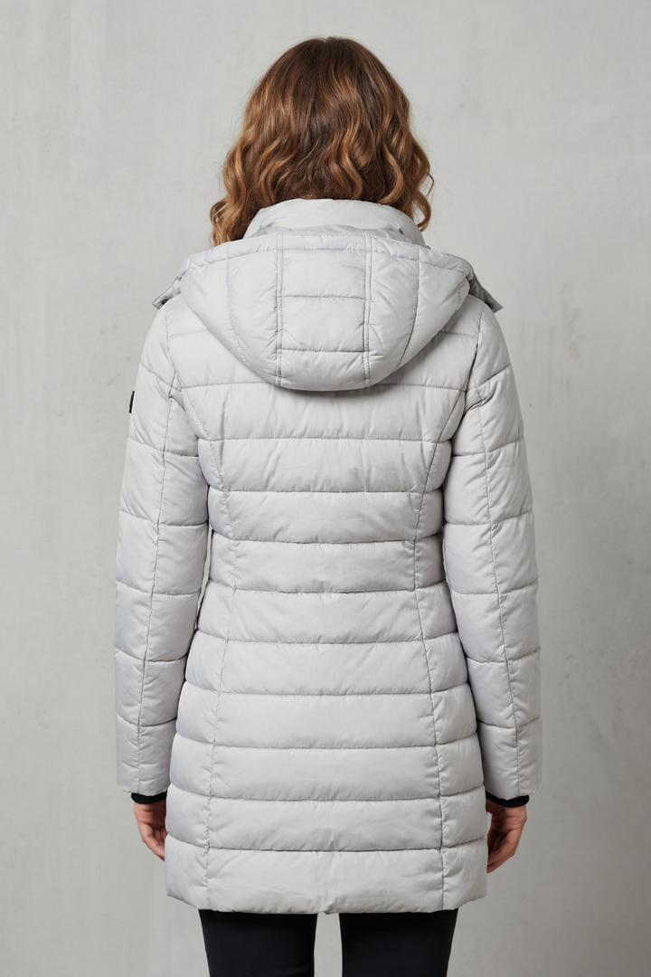 Ladies' lightweight quilted puffer coat, a stylish and warm outerwear choice for fall and winter fashion.