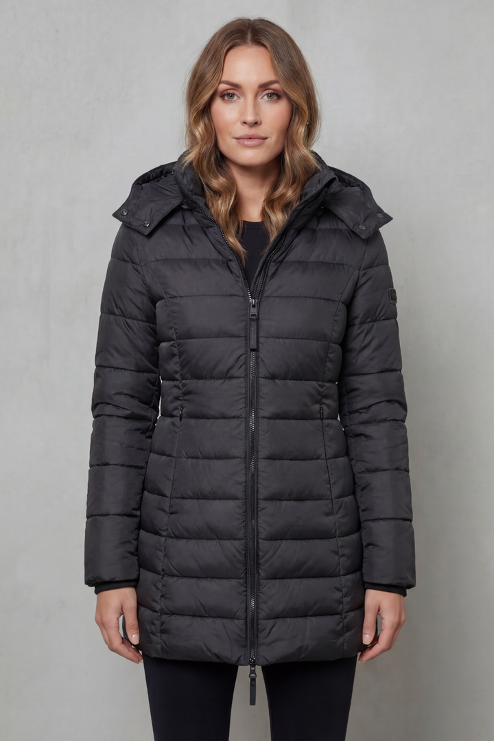Fashionable women's lightweight puffer coat, quilted for a chic look and warm during cooler seasons.