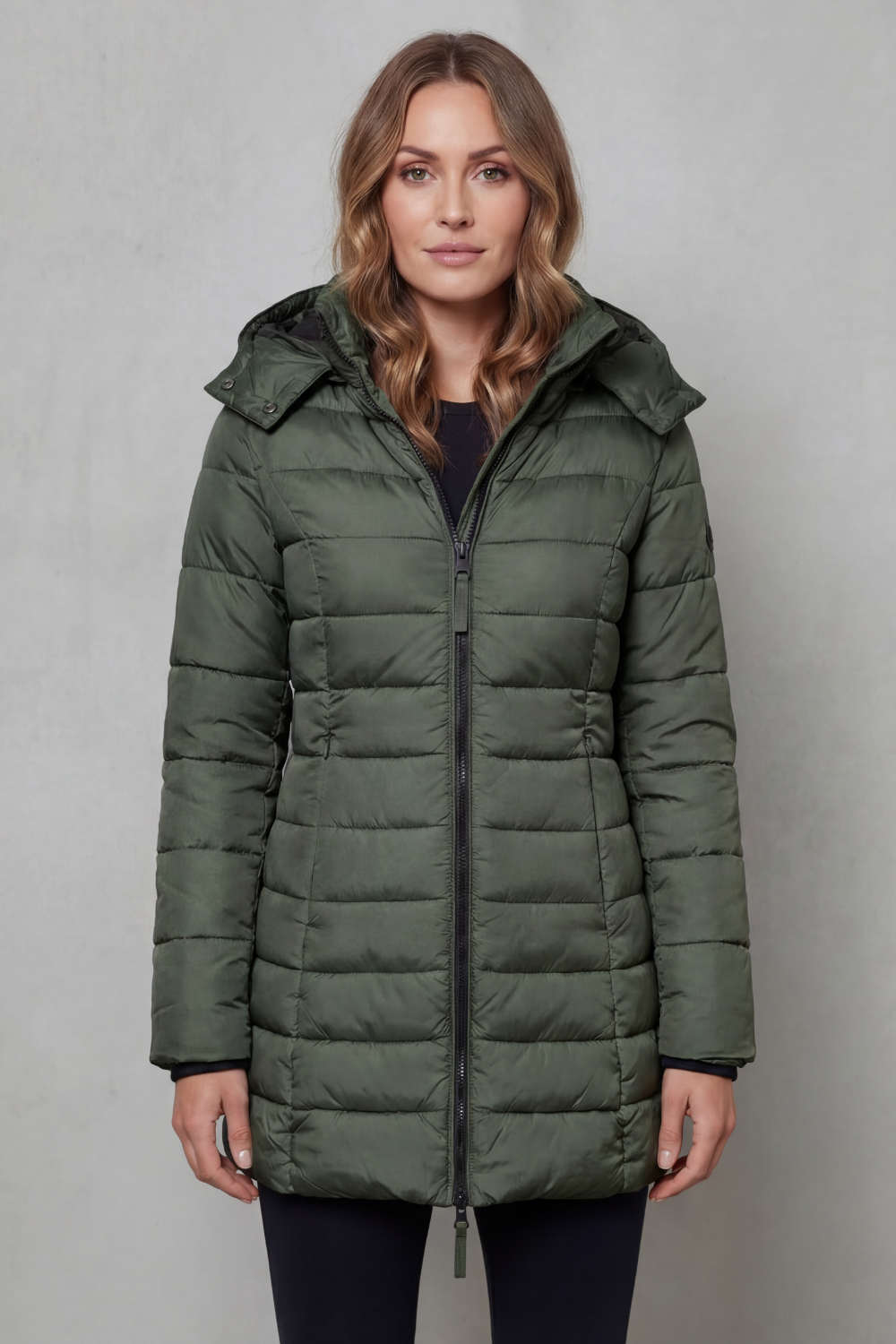 Soft-touch women's lightweight quilted puffer jacket, designed for warmth and comfort in colder months.