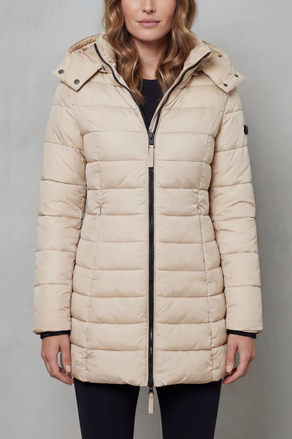Elegant women's puffer coat with quilted pattern, lightweight and warm, perfect for winter layering.