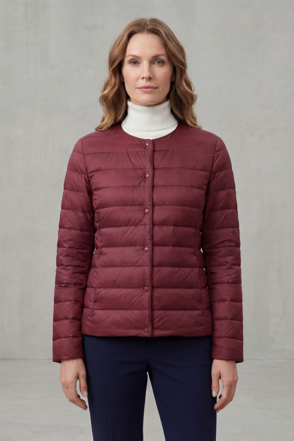 Comfortable women's puffer jacket, featuring a lightweight quilted design for transitional seasons.