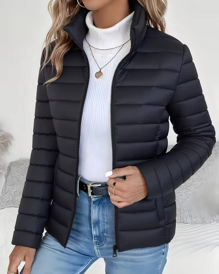 Stylish women's lightweight puffer jacket, quilted design with a chic stand collar.