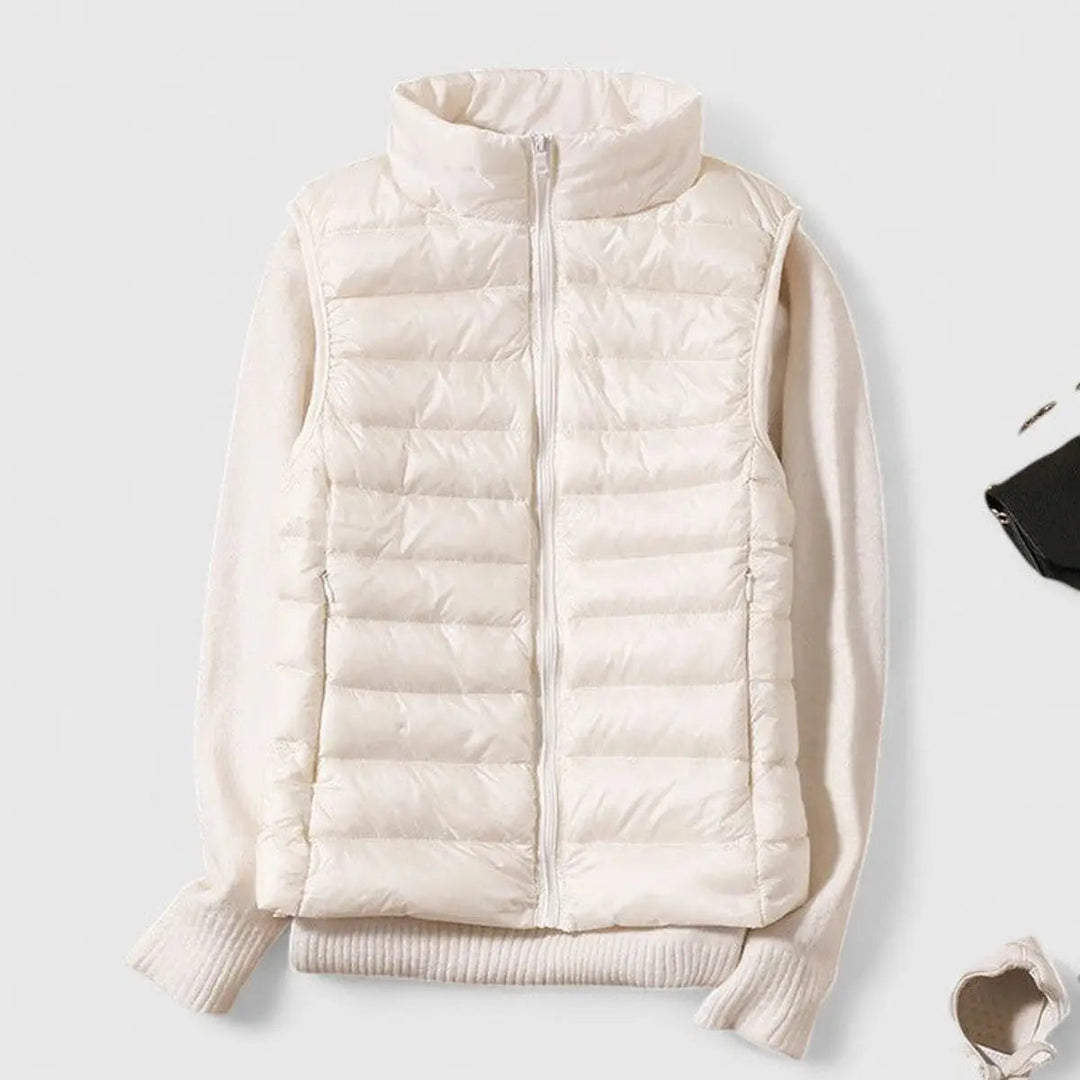 Packable lightweight quilted vest for women. An essential travel vest, offering warmth without bulk.