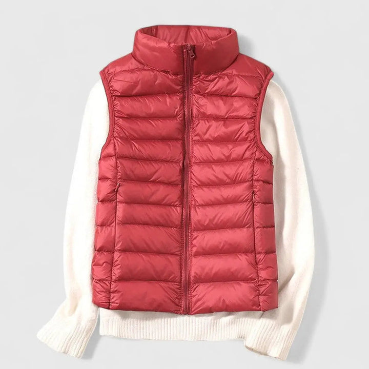 Essential women's lightweight quilted vest. A practical sleeveless gilet for everyday comfort and style.