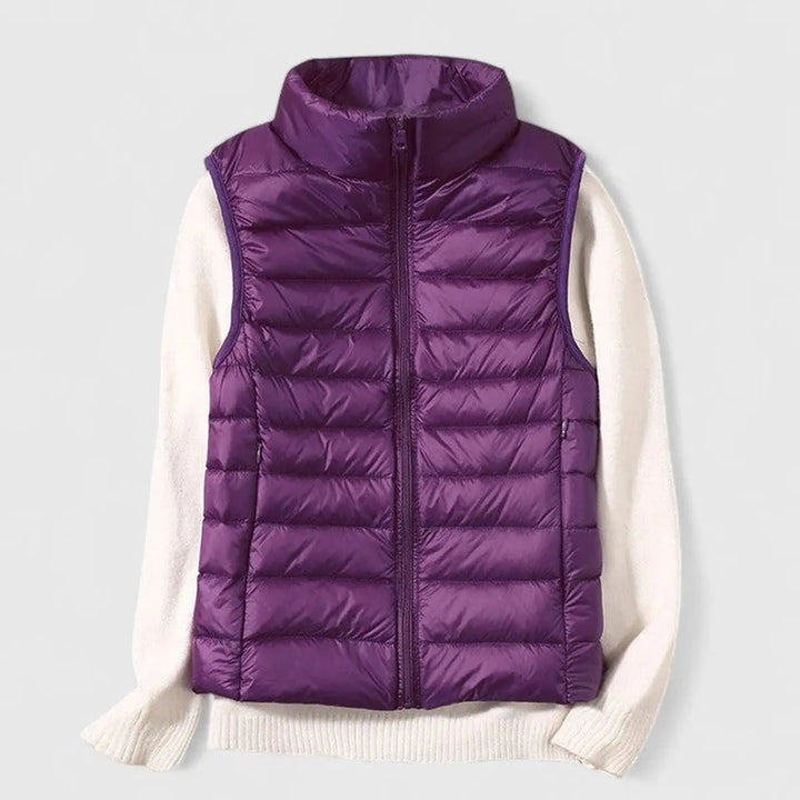 Cozy women's lightweight quilted puffer vest. An easy layering piece, ideal for transitional seasons.