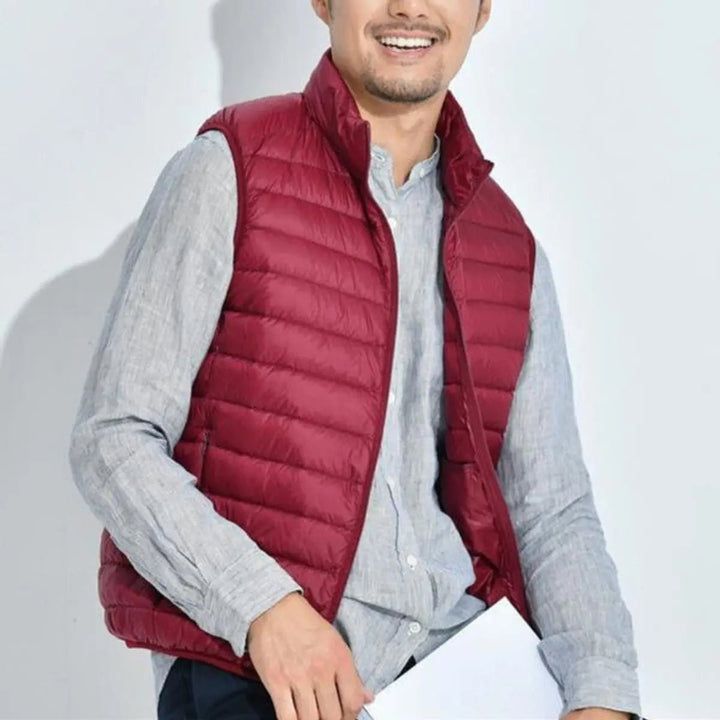 Women's lightweight quilted puffer vest with zip-up front, perfect for transitional layering & everyday style.