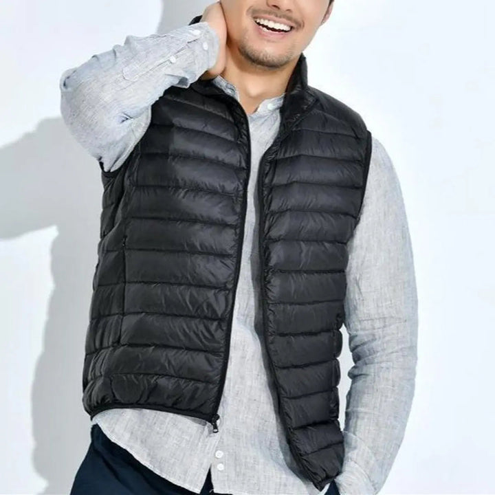 Sleeveless women's quilted gilet featuring a stand collar & practical pockets, ideal as a layering piece.