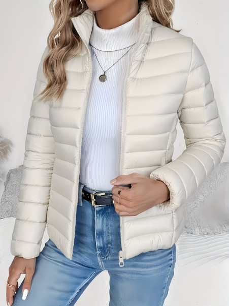 Comfortable women's lightweight quilted spring jacket, offering a tailored fit for elegant daily wear.
