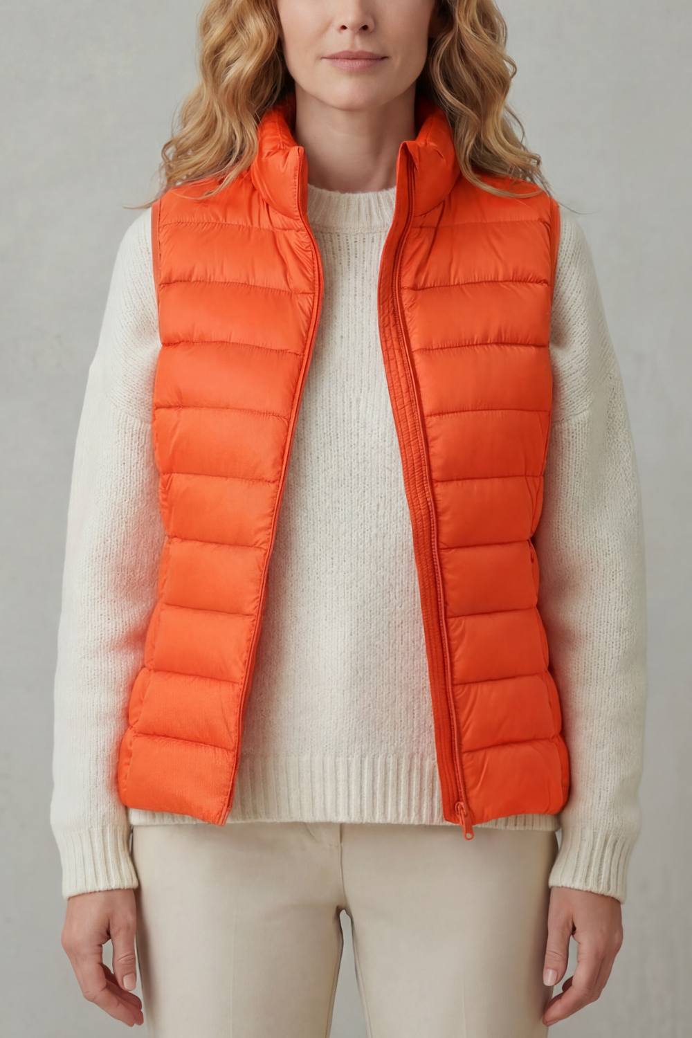 Warm & light women's quilted vest, ideal for autumn layering fashion.