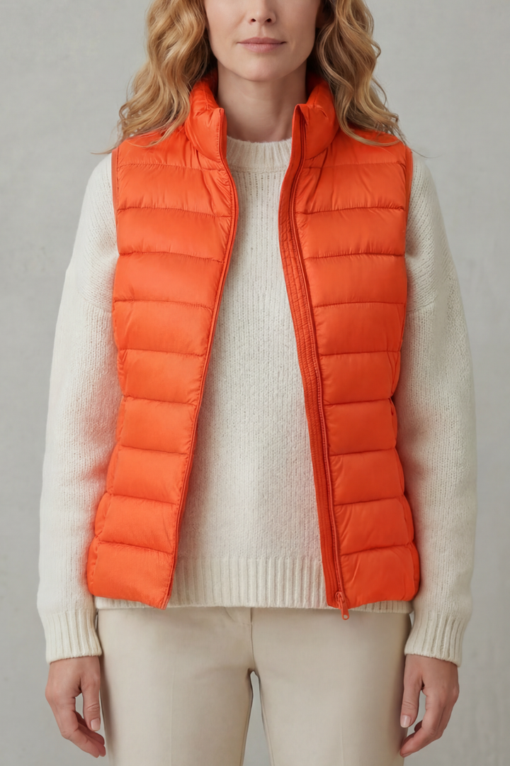 Warm & light women's quilted vest, ideal for autumn layering fashion.