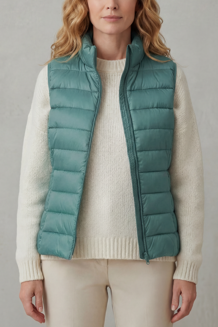 Versatile women's layering vest, lightweight quilted design for comfort.