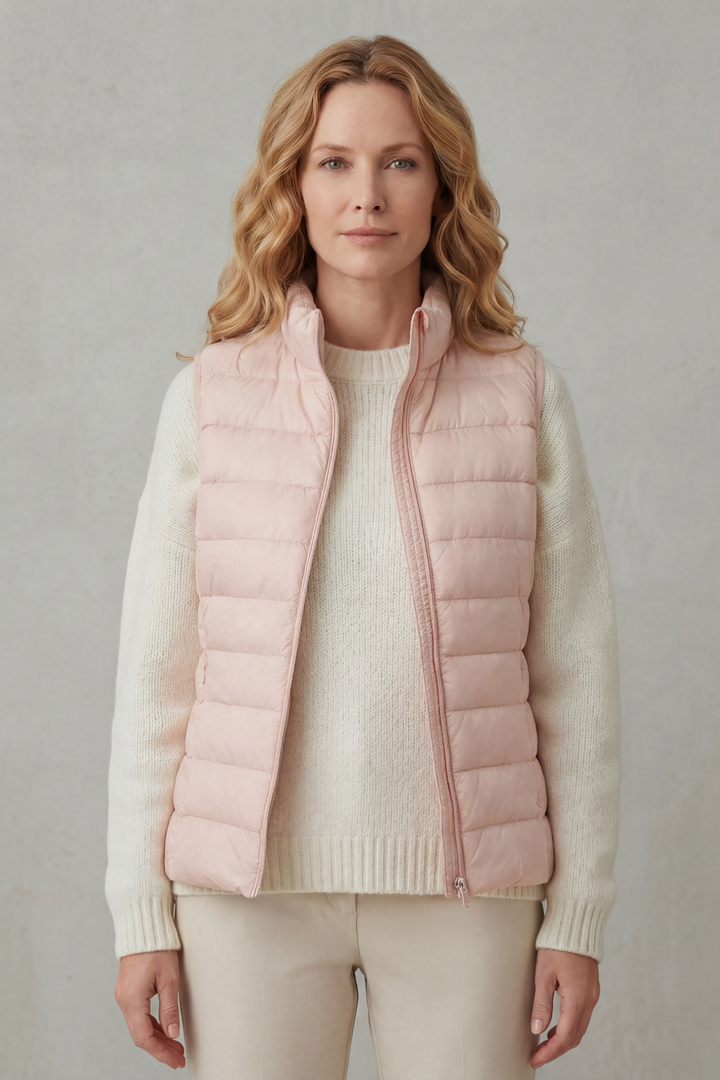Warm women's quilted vest, lightweight and perfect for everyday elegance.