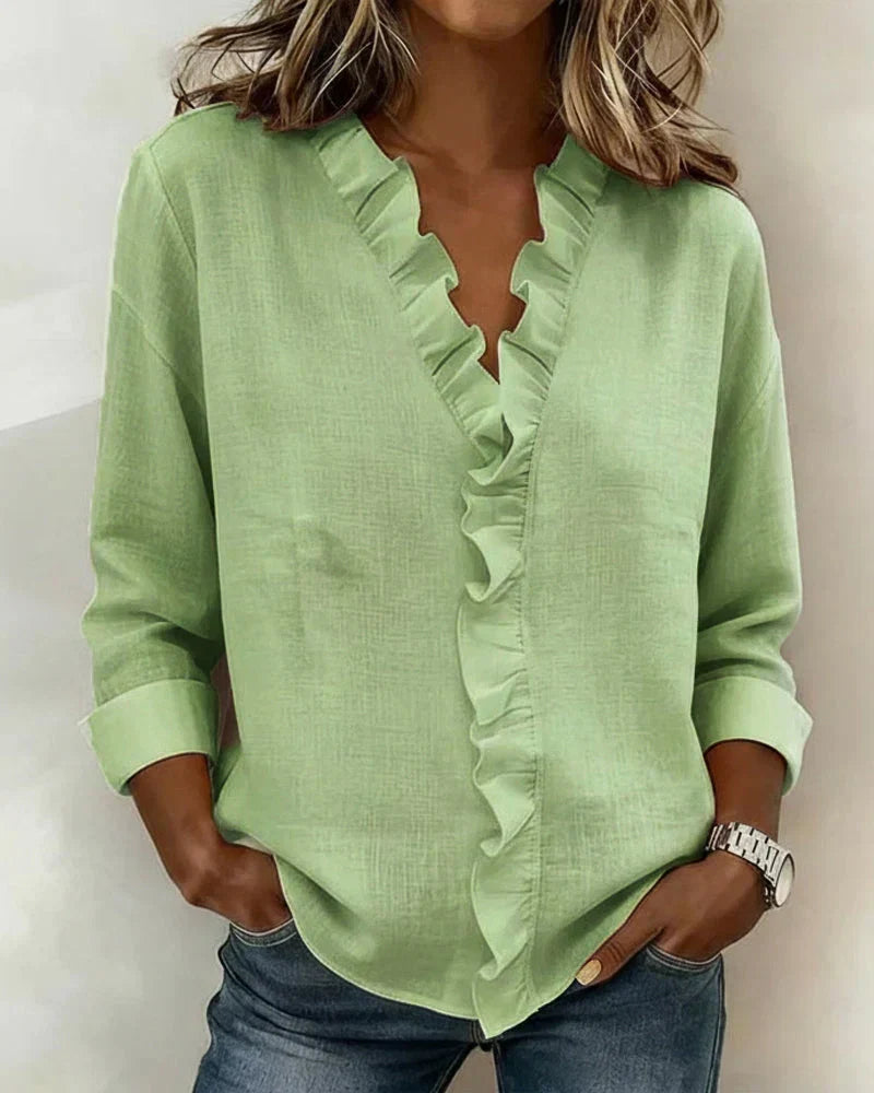 Lightweight women's ruffled V-neck blouse, a comfortable and elegant everyday top.
