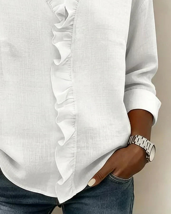 Ruffled long sleeve V-neck blouse for women. A comfortable and versatile top for modern fashion.