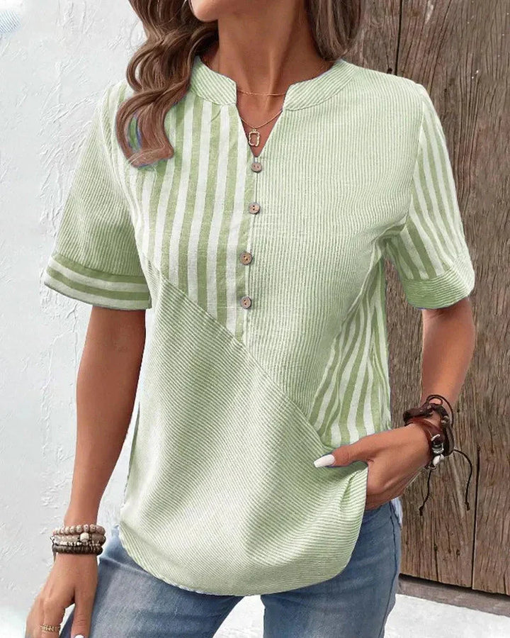 Casual elegant women's lightweight striped top with mandarin collar. Ideal for spring fashion, work wear, or everyday chic.