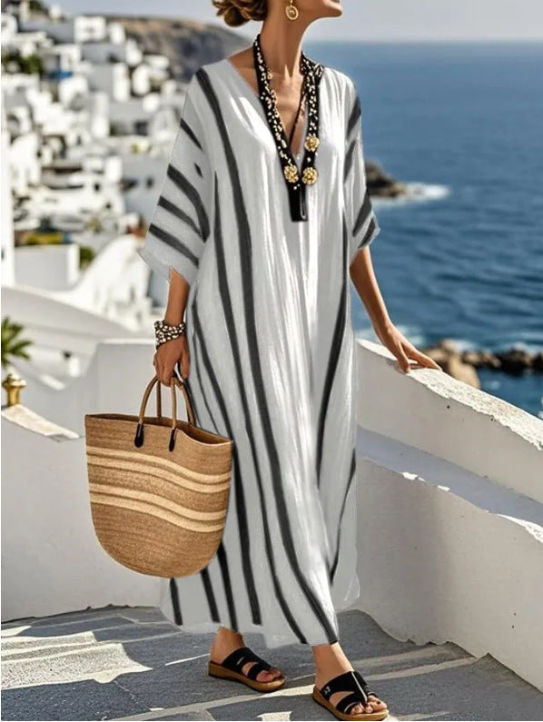 Comfortable women's lightweight striped kaftan dress. A stylish, flowy maxi for summer, beach & vacation wear.