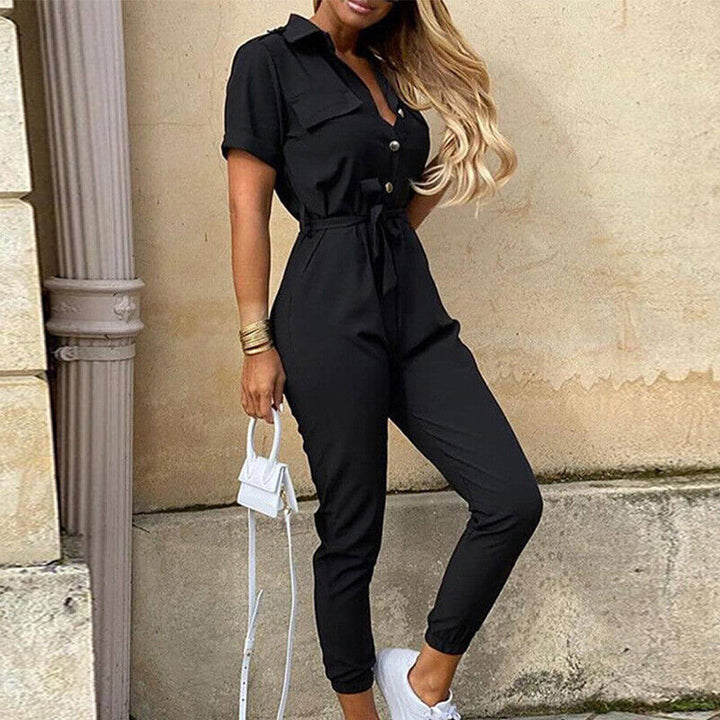 Elegant structured fit jumpsuit for women, short sleeve, ideal for summer casual or dressy looks.
