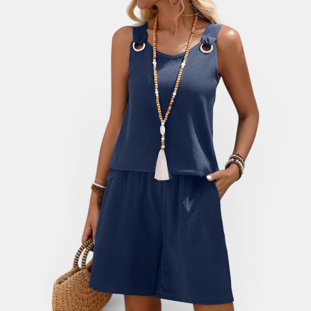 Casual women's resort wear featuring a sleeveless top and comfortable shorts.