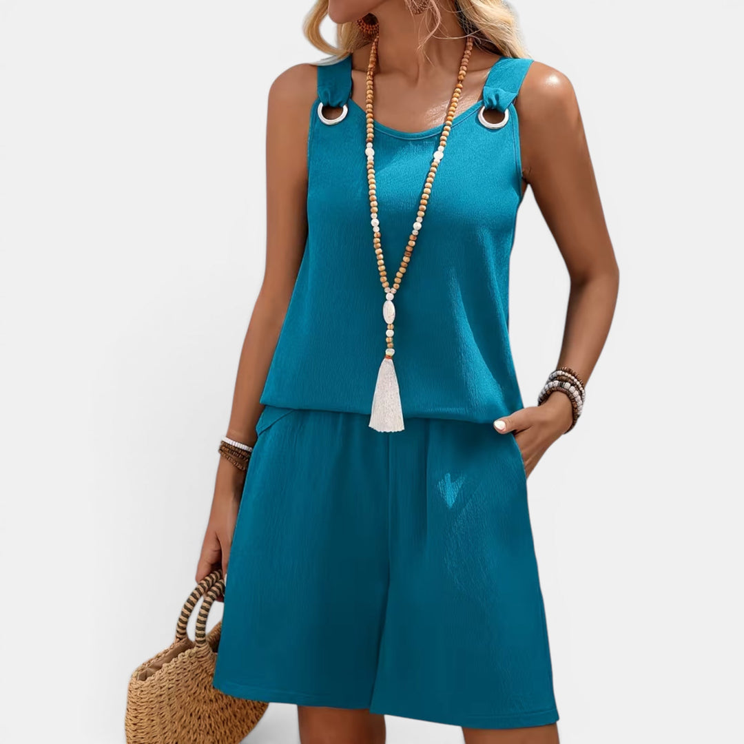 Model wearing a chic two-piece lightweight set, perfect for tropical vacations.