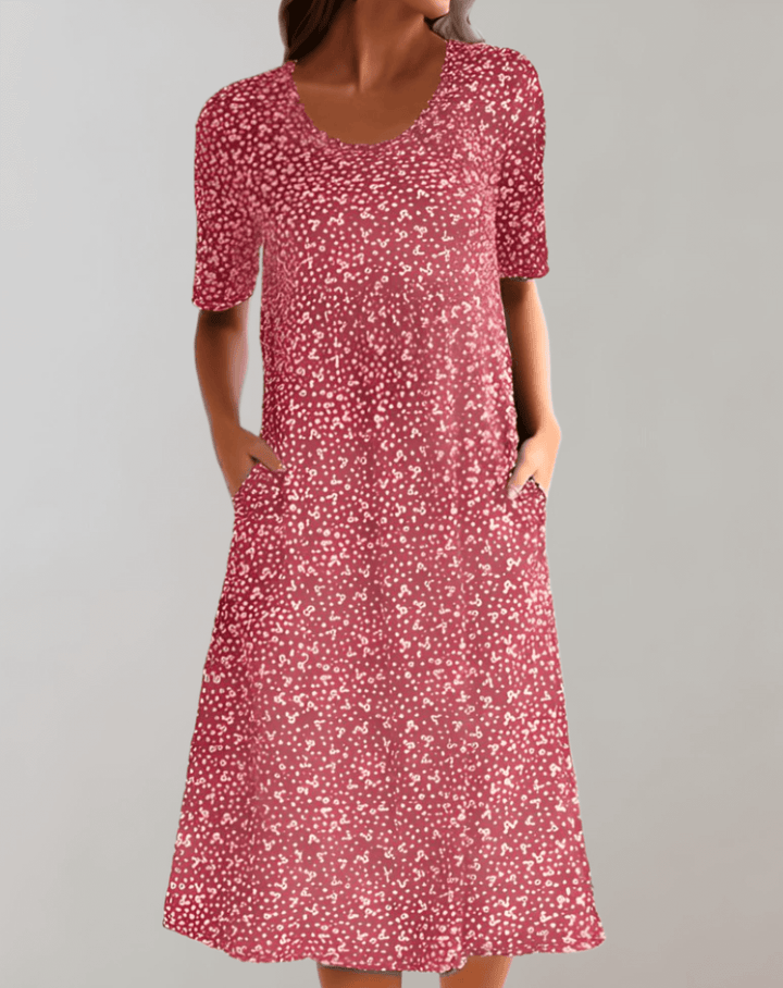 Flowy women's V-neck summer dress, lightweight and comfortable, ideal for beach walks or casual outings.