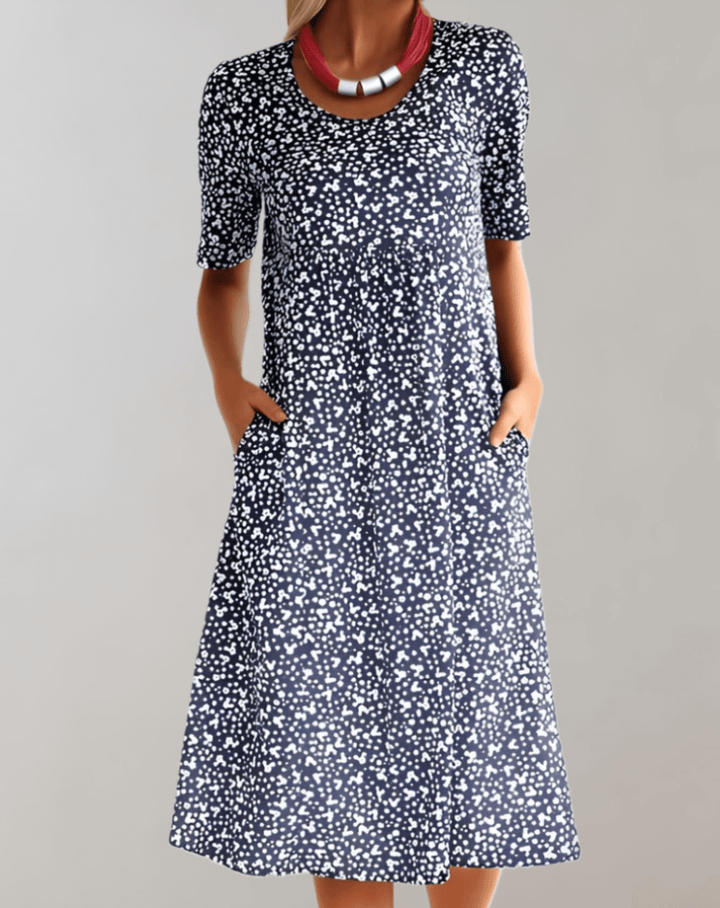 Elegant women's V-neck summer dress, featuring a comfortable, lightweight design. Versatile for day or night.