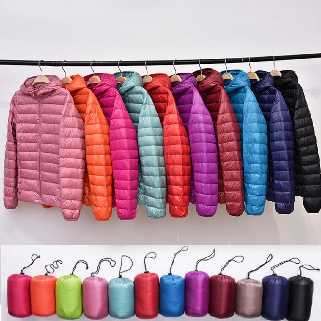 Women's lightweight waterproof down jacket, ideal warm winter coat for outdoor travel adventures.