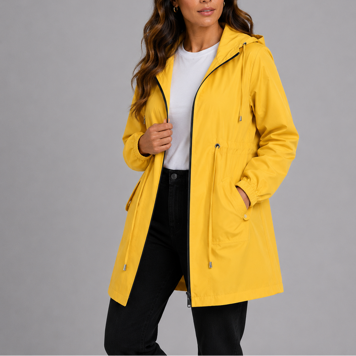 All-weather women's lightweight waterproof raincoat with hood, ensuring dry comfort for outdoor activities.