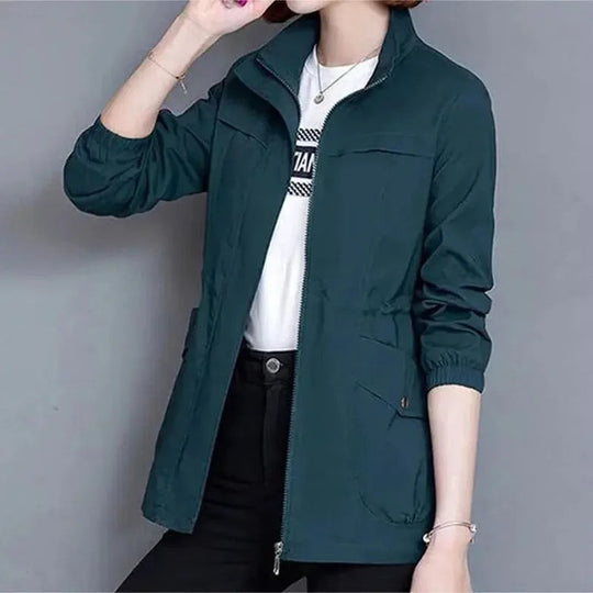 Women's elegant lightweight trench coat. Waterproof and versatile, perfect as a chic rain jacket for all seasons.