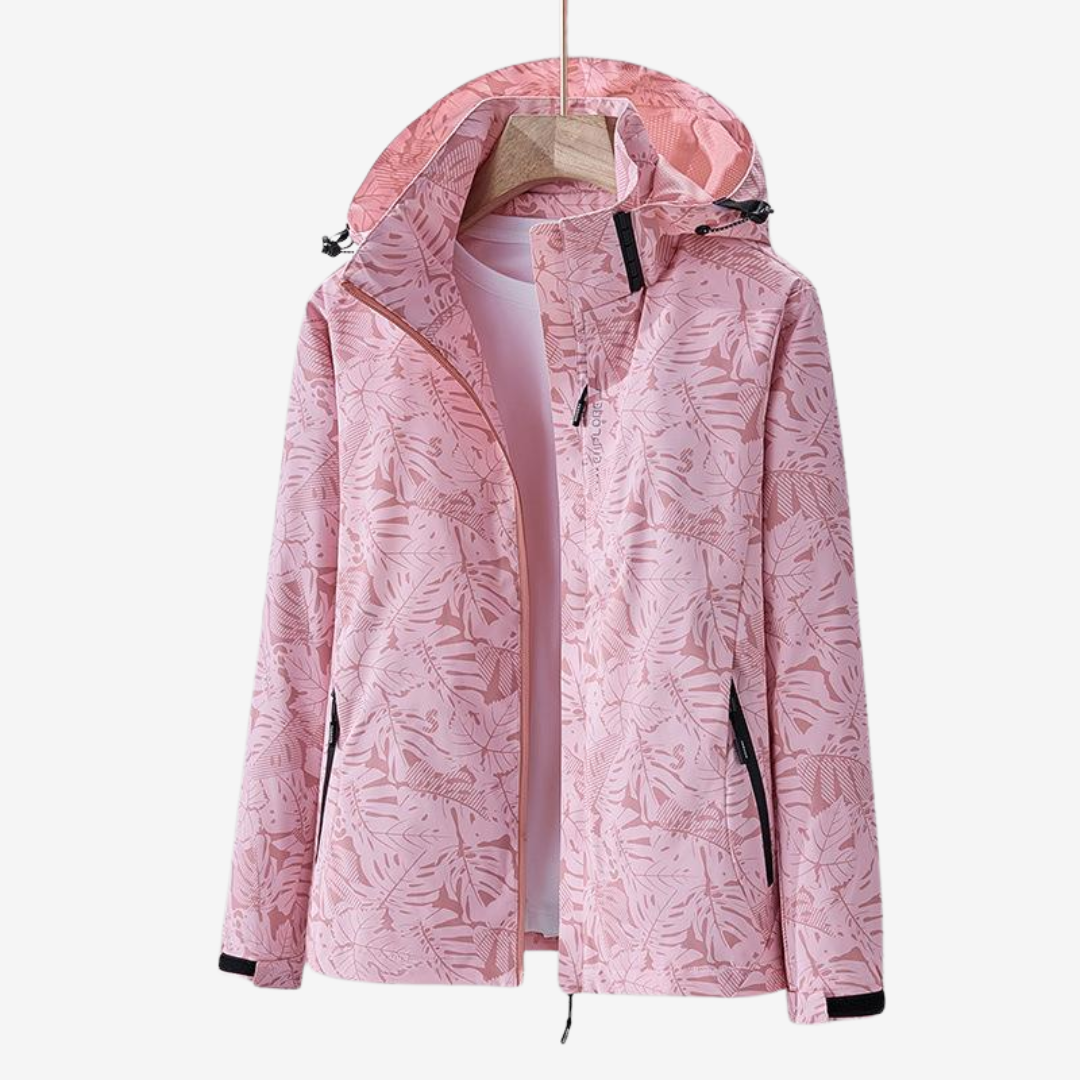 Stylish women's waterproof rain jacket, lightweight & breathable, perfect for athletic outdoor activities.