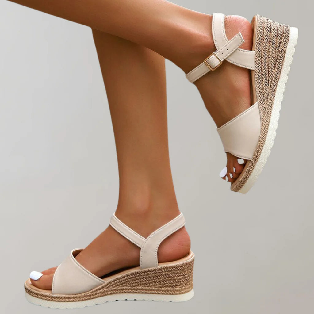 Stylish women's platform wedge sandals with an adjustable ankle strap, ideal for versatile summer casual wear.