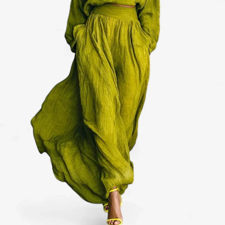 Stylish women's lime green textured mock-neck top and maxi skirt set, a chic and versatile fashion statement.