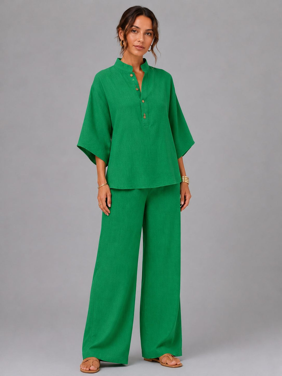 Relaxed fit linen wide leg pants and button shirt set for women. Casual and comfortable summer outfit.
