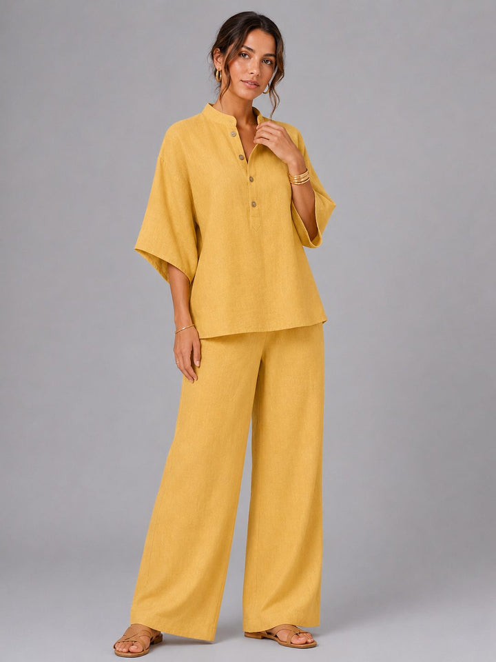 Trendy women's linen wide leg pants & button shirt. This two-piece set is perfect for beach or resort.