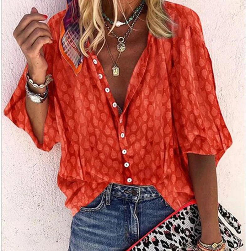 Women's casual printed button-down blouse. Long-sleeve summer top with a relaxed fit for fashion.