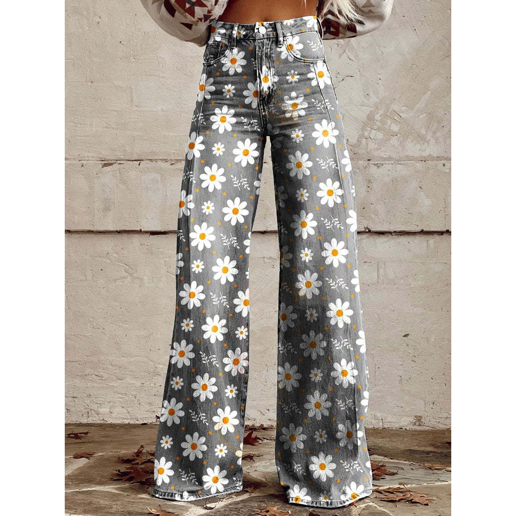 Women's long denim pants with vibrant floral print, perfect for casual wear and everyday style.