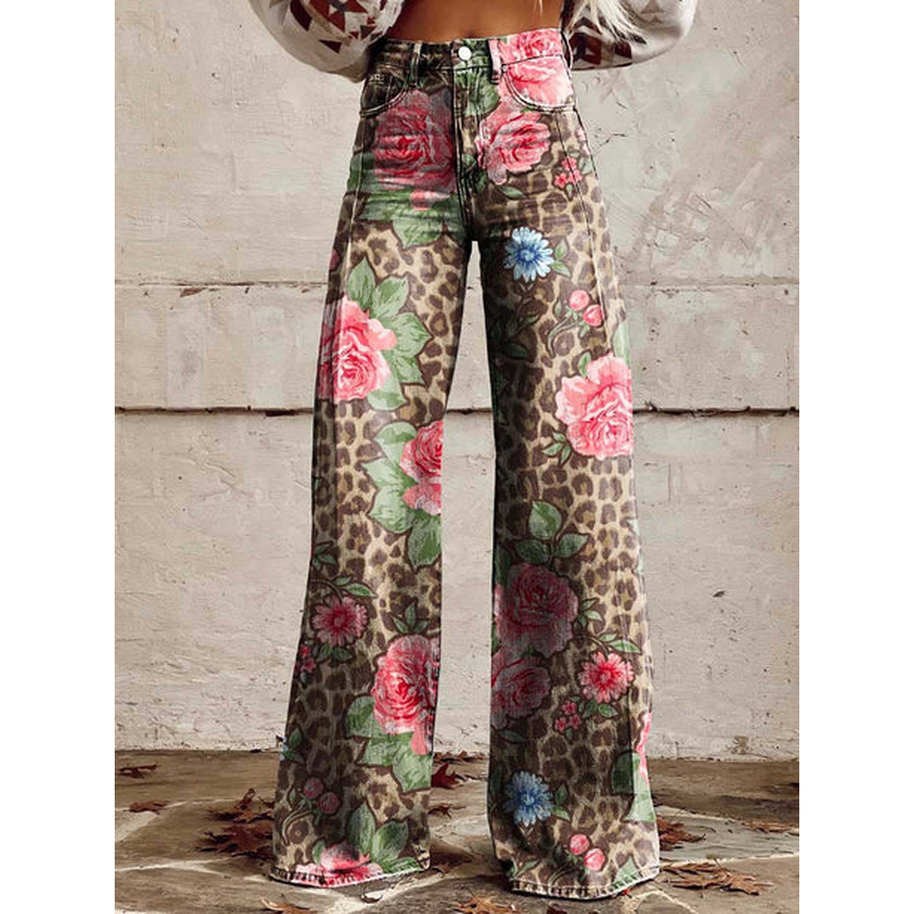 Model wearing women's floral print long denim pants, showing relaxed fit and comfortable movement.