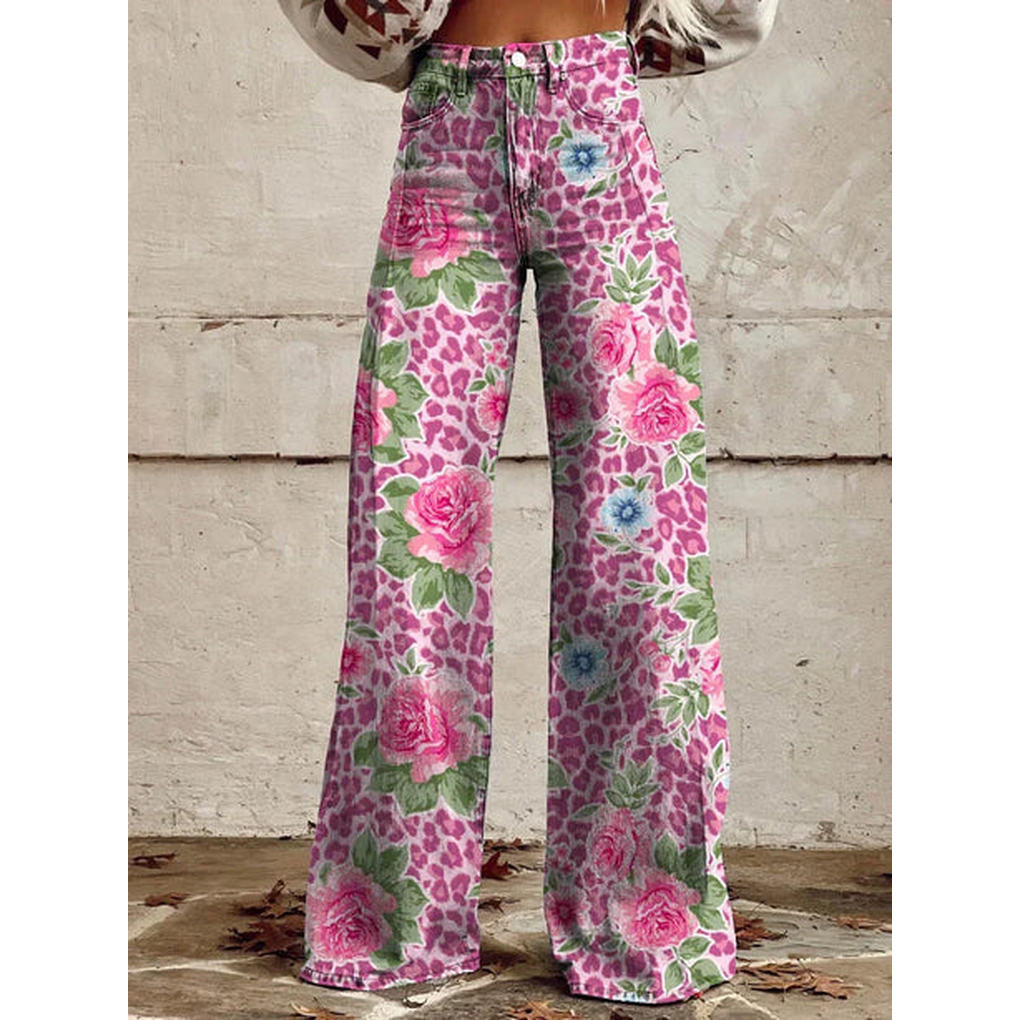 Close-up of comfortable women's long denim pants showcasing a beautiful floral pattern detail.