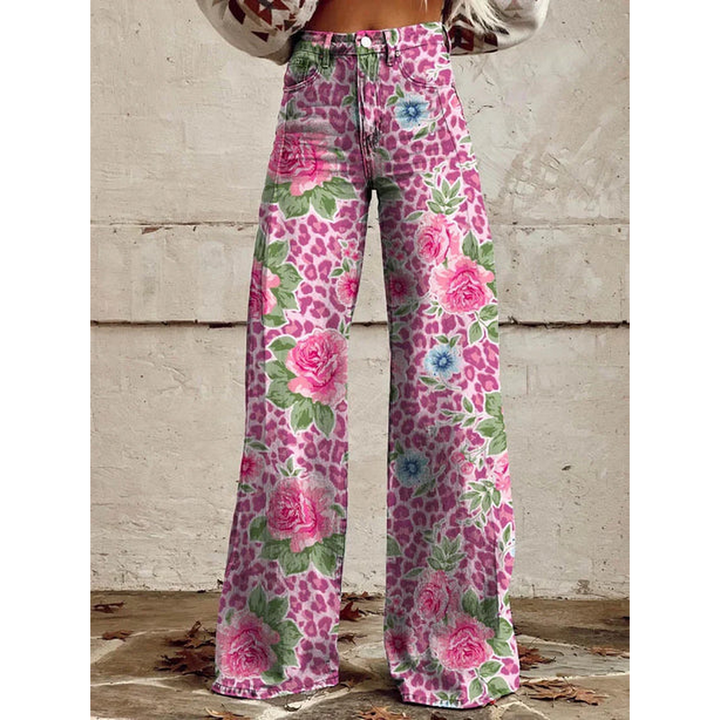 Close-up of comfortable women's long denim pants showcasing a beautiful floral pattern detail.