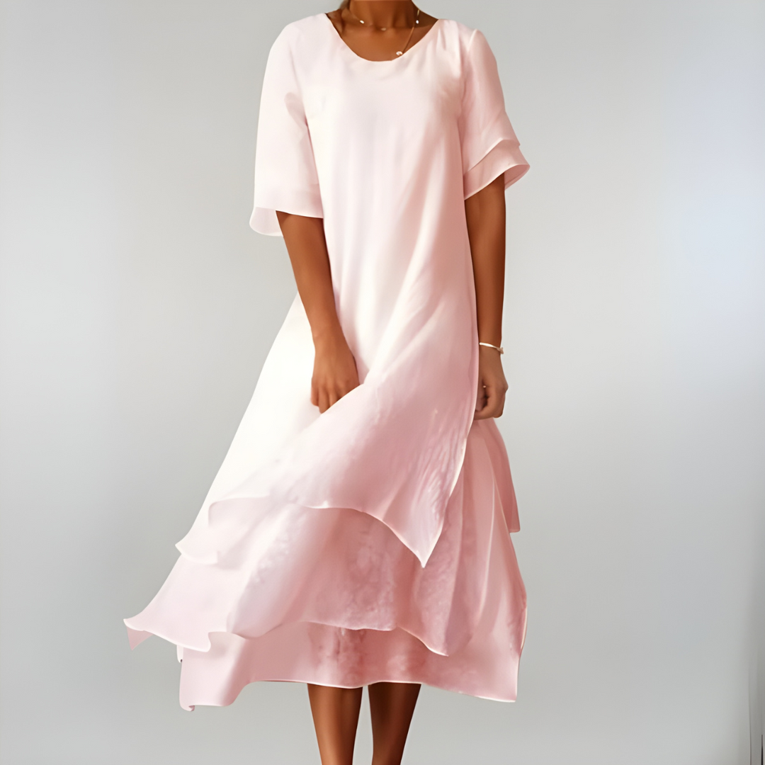 Elegant women's flowy maxi dress, ideal for summer, beach, or vacation. Lightweight and comfortable.
