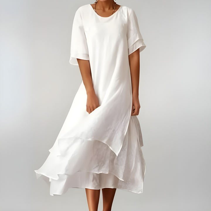 Lightweight women's flowy summer maxi dress, comfortable and breathable for casual wear or beach days.