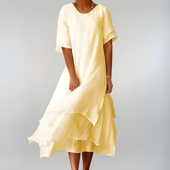 Versatile women's long flowy summer dress with an elegant silhouette, great for casual outings & vacations.