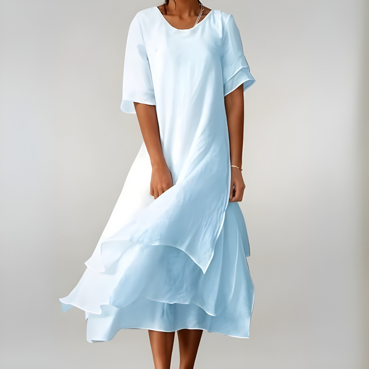 Chic women's long flowy summer maxi dress, perfect for warm weather, beach trips, or stylish vacation looks.