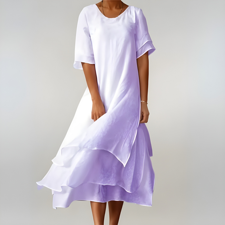 Comfortable women's flowy summer dress, an elegant long maxi style for casual, beach, or vacation wear.